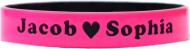 pink with white colored text custom silicone wrist bands